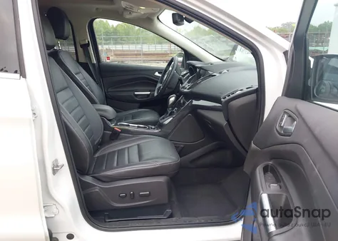 2016 Ford Escape Titanium z USA, uszkodzony, nr VIN 1FMCU9J99GUA07479